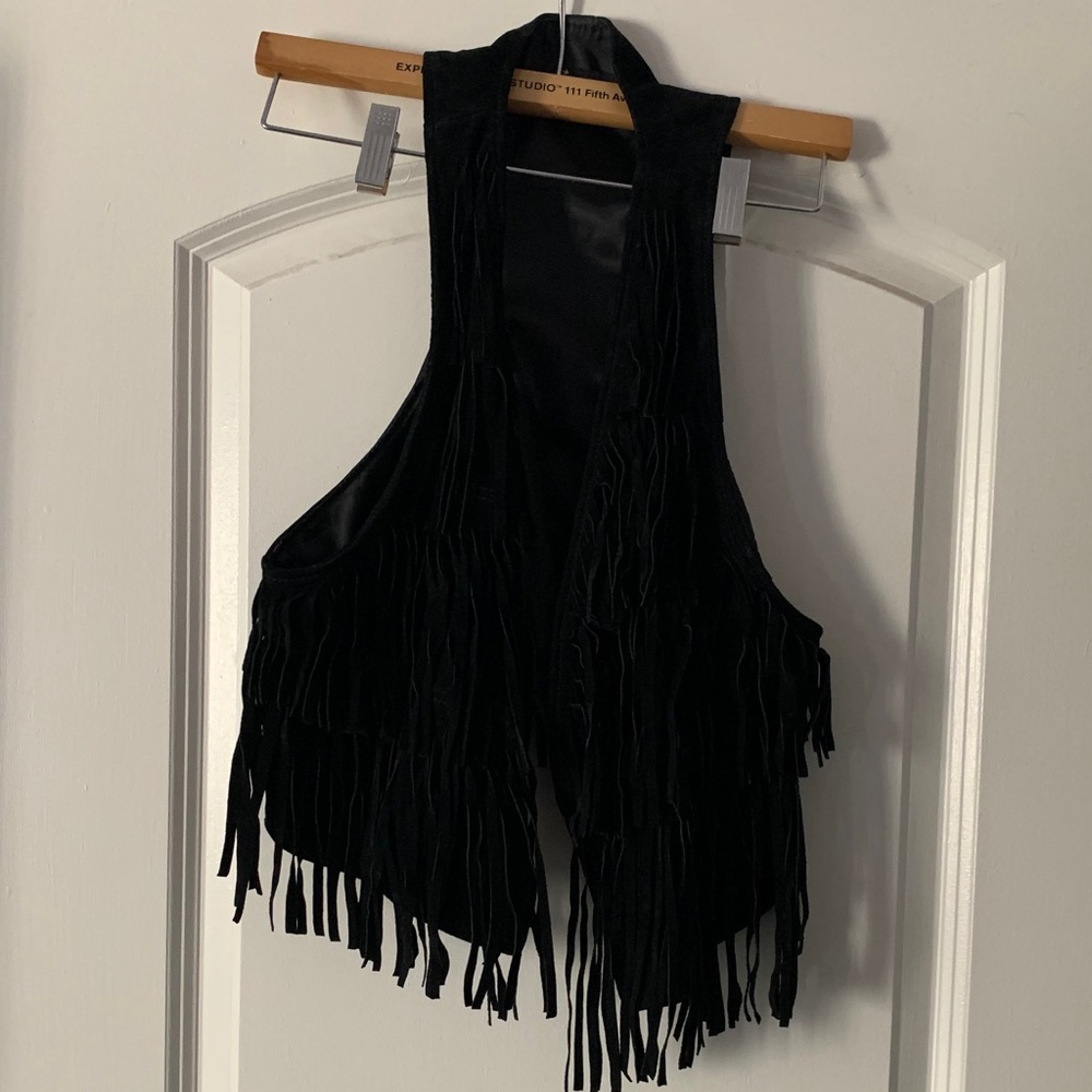 Black fringe vest.